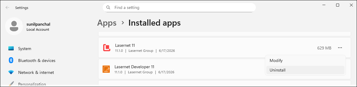 In the Windows applications list the Uninstall menu item for the Lasernet 11 application is selected.